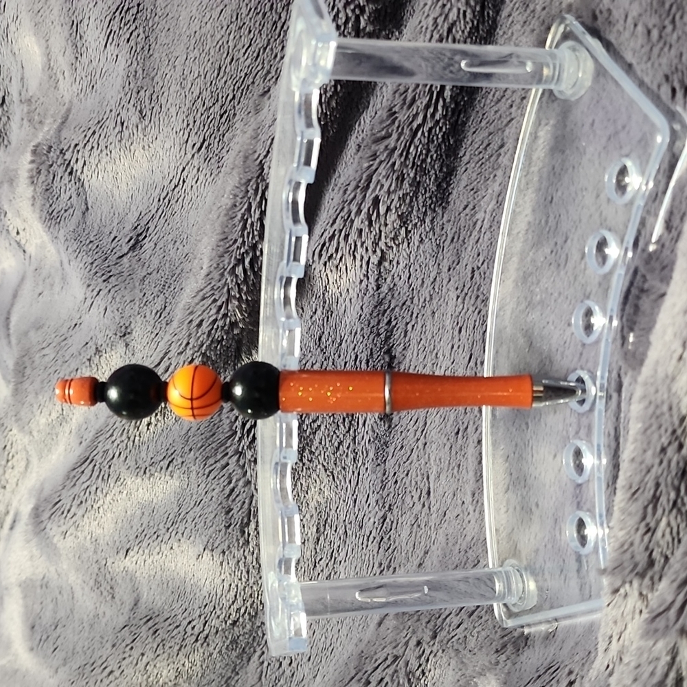 HANDMADE DECORATIVE BASKETBALL PEN. Includes pouch.